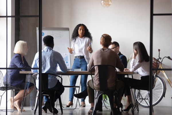 A photo of people in a meeting