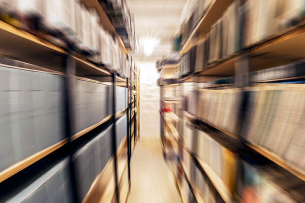 Blurred image of archive bookcases