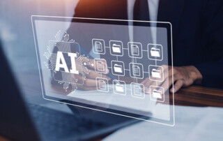 Image of a person using a laptop with document and AI icons